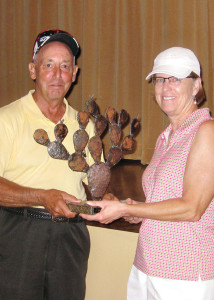 Tom Bruno presents the Prickly Pair Cactus Trophy to Rose Welliver