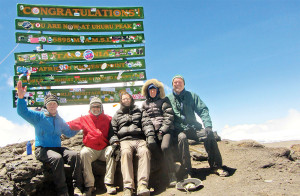 Joe Keegan, Robin Blais, John Oyala, Rachael Slabaugh and Dennis Day on the summit of Mt Kilimanjaro.