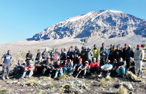 Guides, porters and cooks pose for a group photo at Karanga Campsite, elevation 13,106 feet above sea level.