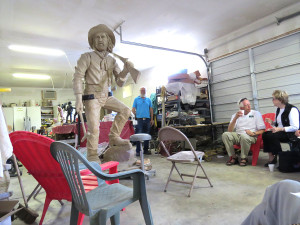 Tim Trask with eight foot statue in progress