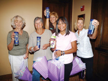 Door prize winners Adele Adams, Acthea Critchlow, Sandy Castle, Charlene Nilson and Linda Bishop show off their prunes.