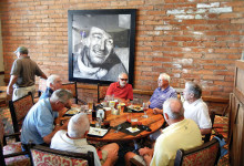 The Duke approves the strategy for the day while the Duffers enjoy breakfast.