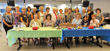 The shower committee was rewarded with hugs and smiles for their efforts to make the moms aware of the love and respect the military has from the community; photo by Eileen Sykora