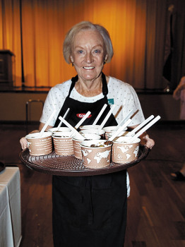 JoDe McAdams is ready to serve dessert; photo by Eileen Sykora