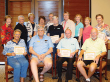 Library volunteers recently honored for their service are seated (left to right) Muriel Larson (nine years), POA Board Liaison Gil Lusk, Larry Thomson (seven years), Phil Geddes (nine years); standing (left to right) Sheila Corcoran-Perry (nine years), Dianne Thomson (seven years), Lori Klug (10 years), Vicki Workman (nine years), Joanne Scott (five years), Kay Perkins (five years), Ginny Post (10 years), Jean Iannacchino (six years), Sharon Corcoran (five years) and Jean Rader (nine years). Not pictured: Marilyn Ashman (seven years), Cathy Stevens (seven years) and Carolyn Tollefson (seven years).