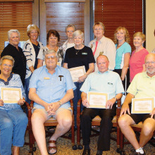 Library volunteers recently honored for their service are seated (left to right) Muriel Larson (nine years), POA Board Liaison Gil Lusk, Larry Thomson (seven years), Phil Geddes (nine years); standing (left to right) Sheila Corcoran-Perry (nine years), Dianne Thomson (seven years), Lori Klug (10 years), Vicki Workman (nine years), Joanne Scott (five years), Kay Perkins (five years), Ginny Post (10 years), Jean Iannacchino (six years), Sharon Corcoran (five years) and Jean Rader (nine years). Not pictured: Marilyn Ashman (seven years), Cathy Stevens (seven years) and Carolyn Tollefson (seven years).