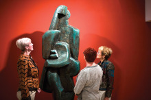 Theo Borden, Judith Cox and Bonnie Hyra admire the sculpture by Jacques Lipchitz at the UA Museum of Art.