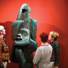 Theo Borden, Judith Cox and Bonnie Hyra admire the sculpture by Jacques Lipchitz at the UA Museum of Art.