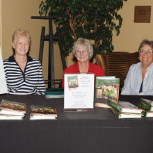 Debbie Rowe, Rena Craine and Cindy Day are among the many TWOQC club members that volunteer their time to sell cookbooks.