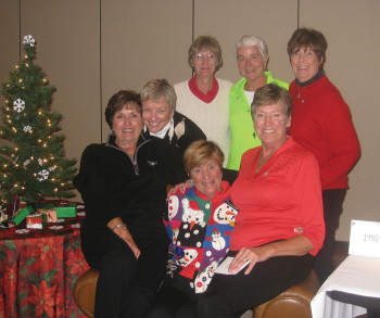 Flight C Ringer winners, standing: Dianne Turner, Nancy Planck, Kris Weinberg and Gail Phillips; seated, Judy Murray, Carol Clifford and Holly Crombie