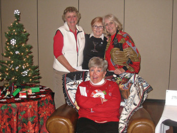 Flight D low net ringer winners, standing: Linda Matsen, Ann Brooks and Marie Duncan; seated Susan Kuehn