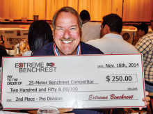 Mike Schlesinger shows off his second place, 25 yard bench rest check for $250.