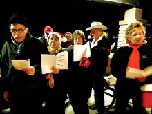 Carolers performing at the Grill.