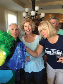 The cheerleaders: Linda von Felden, Debbie Huber and Deb Riddell