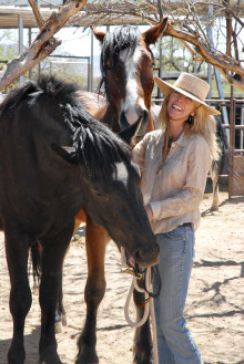 Guest speaker Karen Pomroy with two of the rescued horses at the Amado sanctuary of Equine Voices