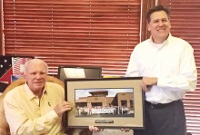 Mr. Ed Robson (left) receives Creative Arts & Tech Center appreciation photo from Quail Creek POA Board member Jack Sarsam.