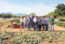 Proud Quail Creek gardeners view their bumper crop.