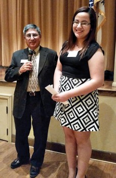 VGA President Tom Contreras awards a scholarship to Luisa Bautista.