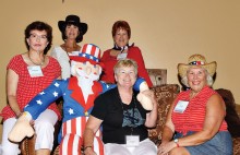 Uncle Sam was a big hit with the ladies. Front row from left: Celeste Kyle, Eileen Sykora and Judy Butler; back row: Pam Coulter and Sandi Beach.