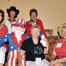 Uncle Sam was a big hit with the ladies. Front row from left: Celeste Kyle, Eileen Sykora and Judy Butler; back row: Pam Coulter and Sandi Beach.