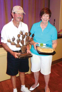 President Skip with Prickly Pair Trophy and Gail Phillips holds the Humble Pie