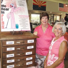 Gail Phillips and Cheri Sipe proudly show off the new Rally for the Cure Registration Chest of Drawers