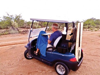Jim Hall a la cart during a painting excursion into the desert July 31.