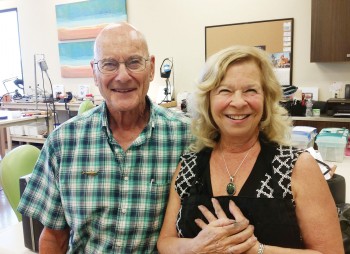 Cathy Hasson wearing her pendant, with Instructor Pete Irish