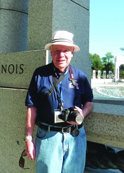 Don Peterson of Tucson stands in front of the WWII Memorial for the first time during his Honor Flight trip to Washington DC from September 12 through 14. His guardian was TWOQC member Joette Schenck; photo by Joette Schenck.
