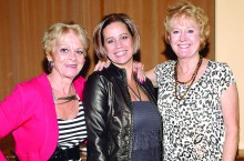 Presenter Tammi Graham (center), assisted by Nancy Anttonen and Diane Aitken, gave fashion advice to TWOQC.