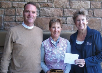 Left to right: Joel Jaress, club pro; Karen Stensrud, club champion; and Nancy Hoppe, tournament manager