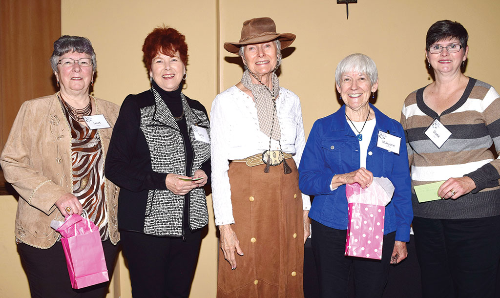 Shirley Pinkerton, center, with door prize winners (left to right): Janet Connell, Sandi Beach, Marjorie Williams and Diana Diou.