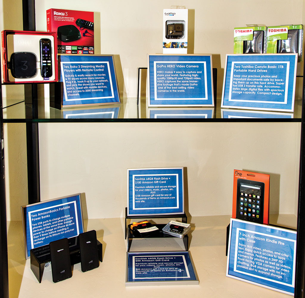 Door prizes were previewed in the club’s  display case in the CATC building several weeks early.