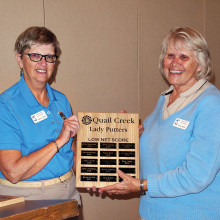 Putters President Cathy Thiele (left), presents the Lowest Average Net Score plaque to Neila Kozel who maintained an average of 34.4 for 2015; photo by Sylvia Butler.