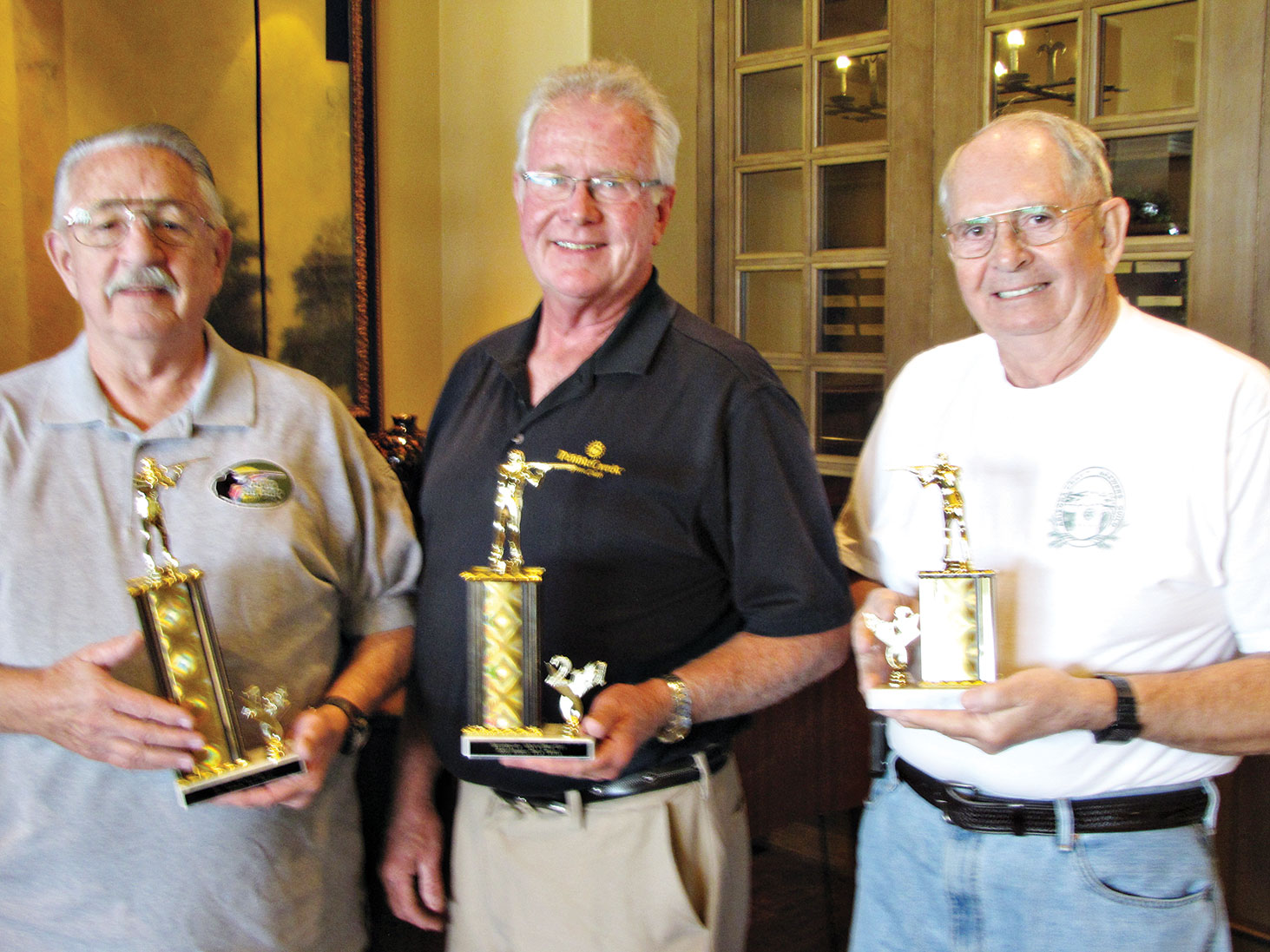 Top men shooters, left to right: Dennis Finn, Jim Pollock and Darwin Puls