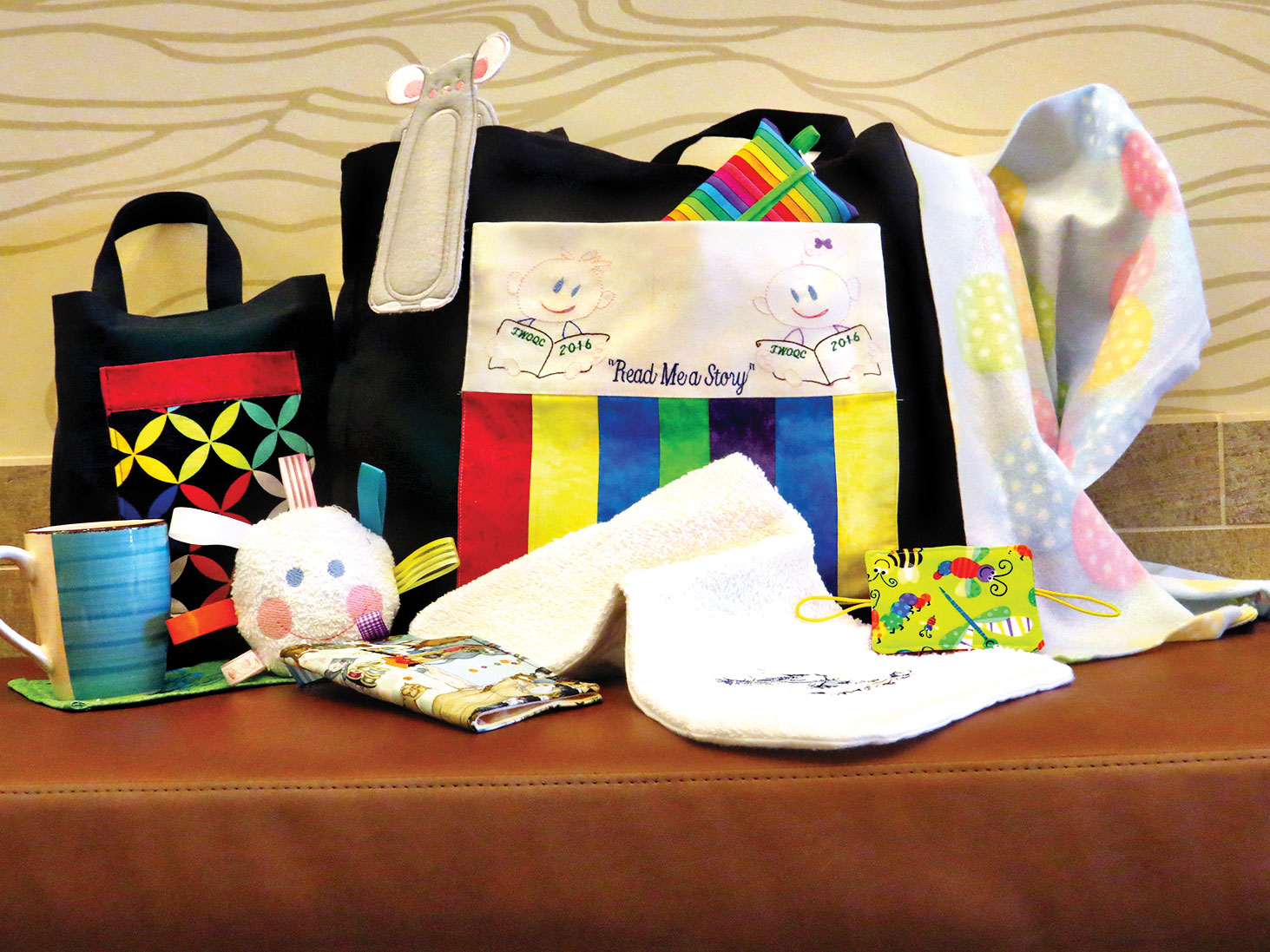 A sample of the numerous baby and mom items that are being made by SueAnn Obremski.