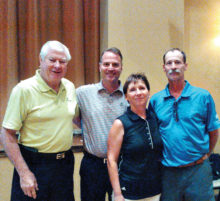 Left to right: Dick Kohlman, president of QCCGA, Joel Jaress, club professional QC, Christie Greiter club champion and Dave Chambers club champion