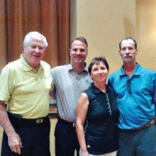 Left to right: Dick Kohlman, president of QCCGA, Joel Jaress, club professional QC, Christie Greiter club champion and Dave Chambers club champion
