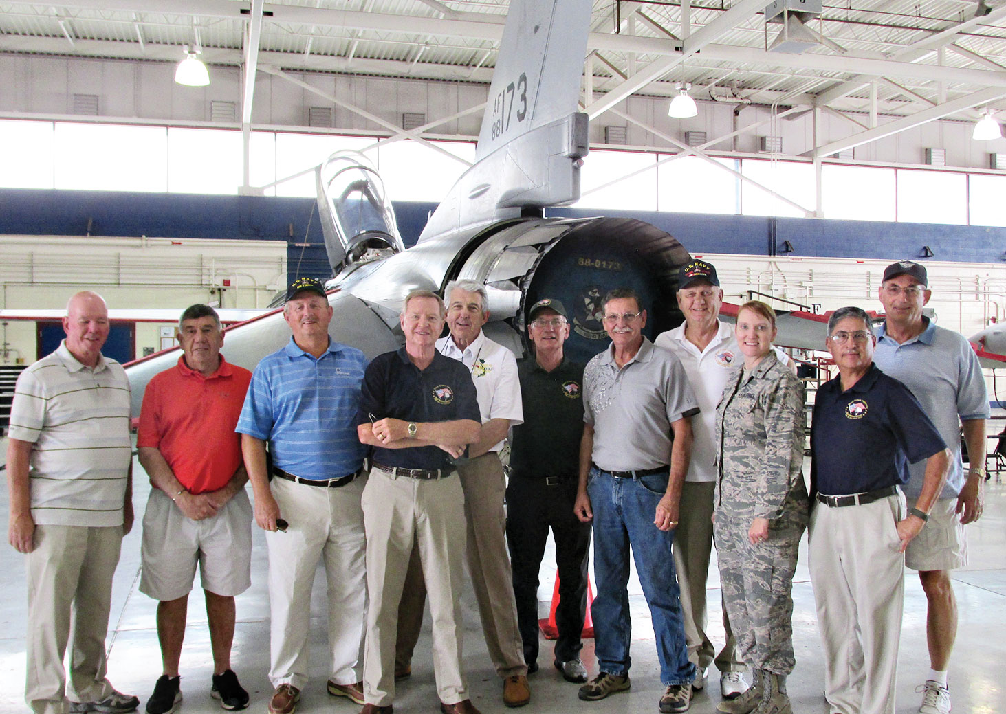 Members of Quail Creek’s Veterans Golf Association tour the F-16 pilot training facility at the Tucson International Airport.