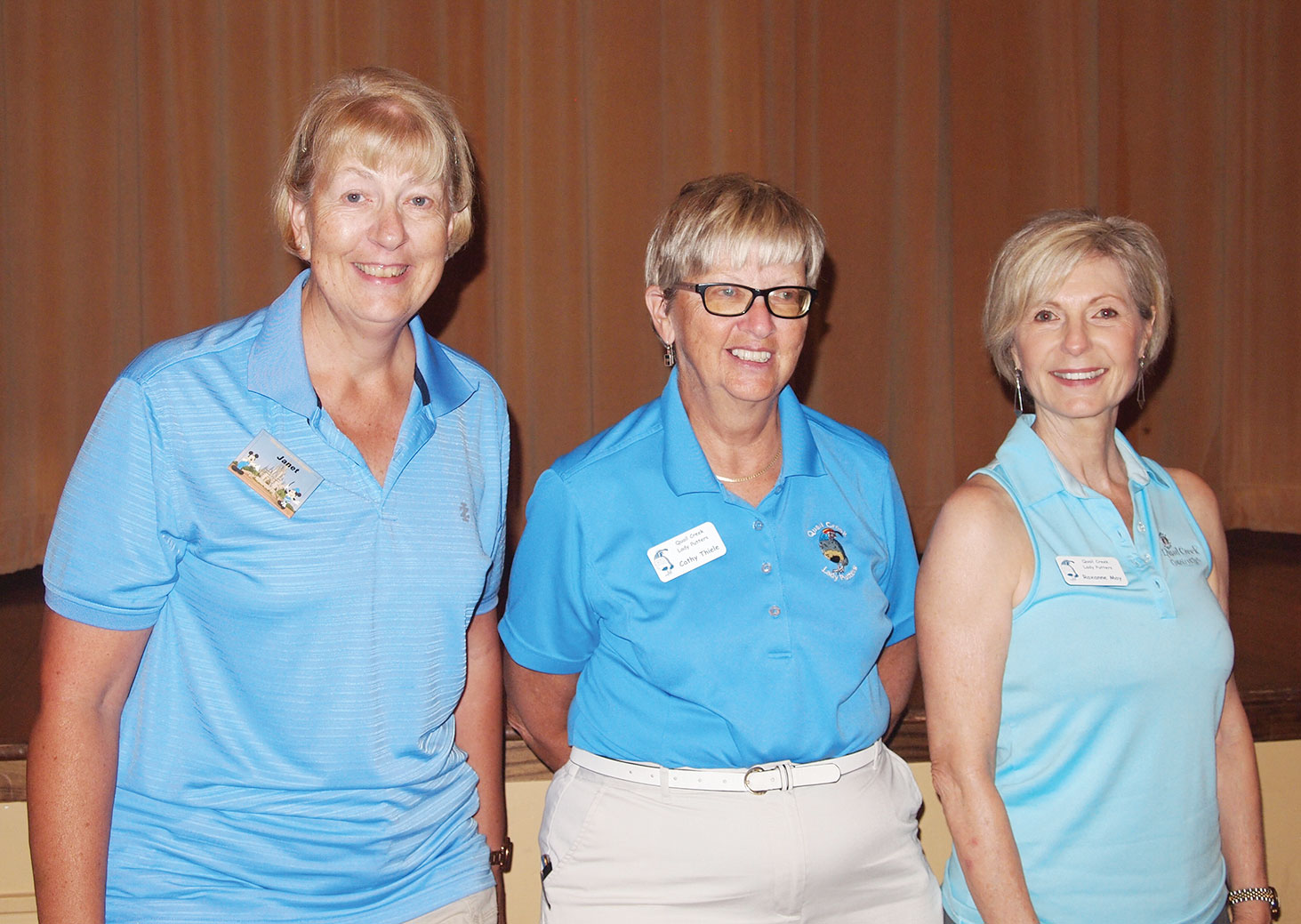 Cathy Thiele, (center) joins Janet Wegner (left) and Roxanne May who recently scored under 40 for the first time; photo by Sylvia Butler.