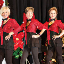 The 2015 PAG Christmas Show was enjoyed by a sold-out audience. Performing here (from left) are Sandy Boyer, Beth Davis and Deb Migdalski; photo by Jeff Krueger.