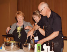 Jeri Hoyle and Randy Wade prepare spiralized salad with the assistance of Carol Mutter; photo by Eileen Sykora