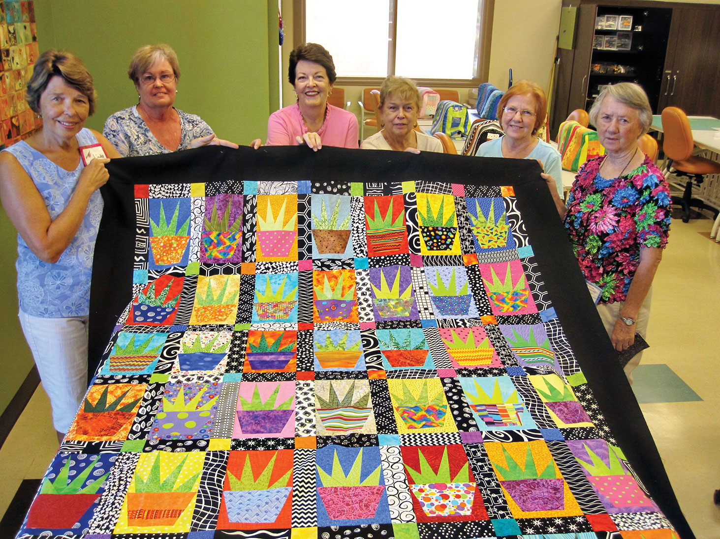 Left to right: Linda Lentz, Marge Swim, Ann Nease, Carol Bisio, Judy Spencer and Marjorie Mitchell. Not pictured, but who worked on the quilt: Pat Neel, Rosie Epler, Jeanne Stevens, Wanda Martin, Kris Wollard, Andrea Drake, Carol Lang, Elizabeth Heintz, Lyn Percy, Sally Trent, Deb Migdalski, Kay Robinson and Linda Surmacewicz.