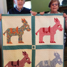 Gordon and Becky Gray with Gordon’s vintage quilt