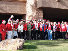 The Lady Putters donned the colors of the season for the annual holiday luncheon; photo by Sylvia Butler