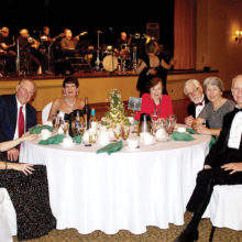 Enjoying the December dinner and dance are members Dodie Prescott, Len and Jana Eaton and Liz and Ken Eden with guests Claire and Orville Smith.