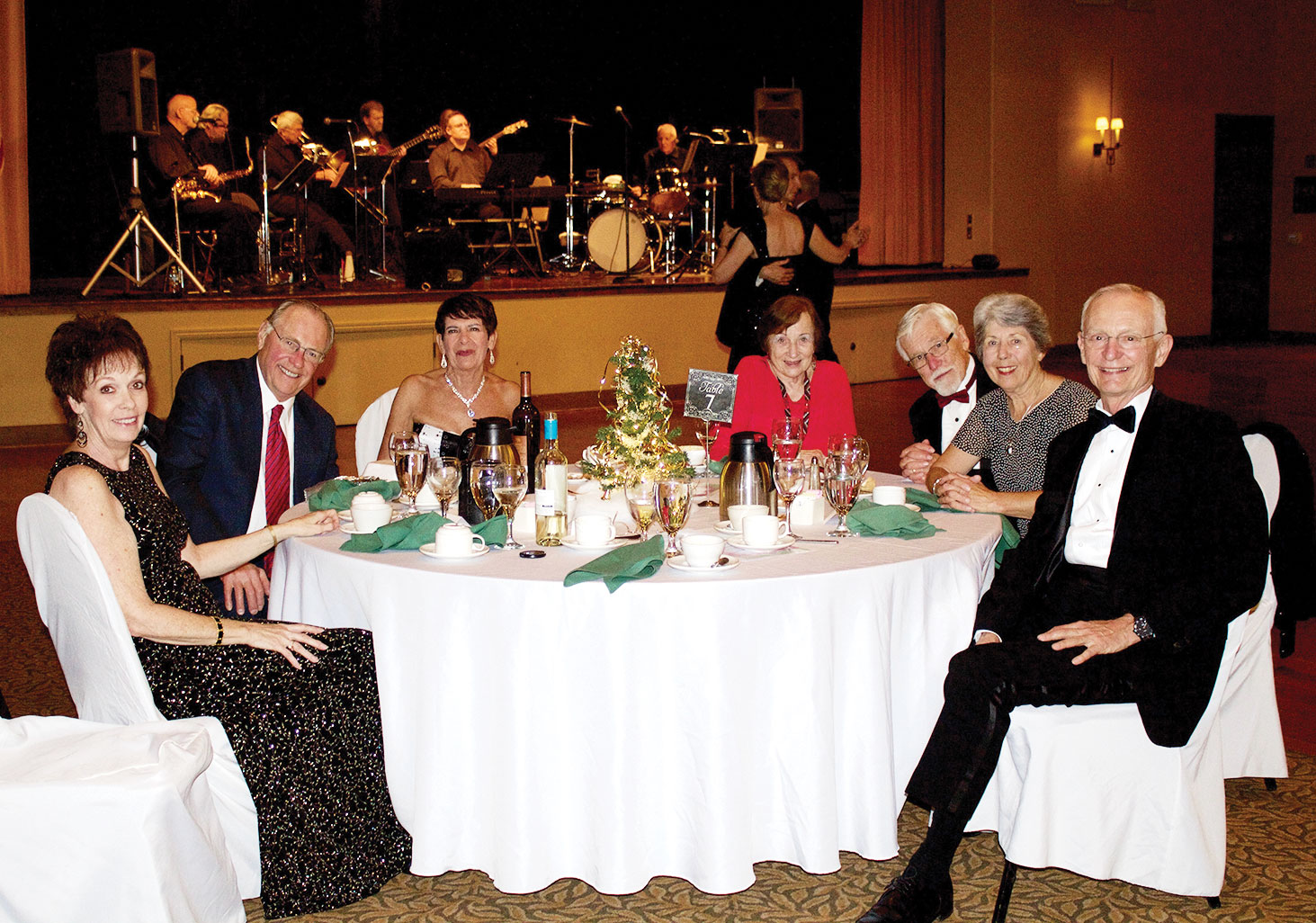 Enjoying the December dinner and dance are members Dodie Prescott, Len and Jana Eaton and Liz and Ken Eden with guests Claire and Orville Smith.
