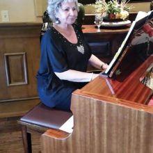 Pianist Cyndy Gierada played a variety of patriotic music during the event; photo by Betty Atwater.