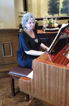 Pianist Cyndy Gierada played a variety of patriotic music during the event; photo by Betty Atwater.