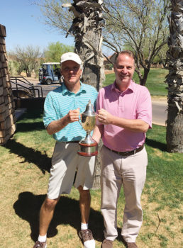 Club Champion Bob Ford receiving the trophy from Head Professional Joel Jaress. This was his eighth time winning this event.